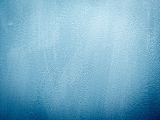 Wall painted in blue texture. Mobile photo