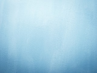 Wall painted in blue texture. Mobile photo