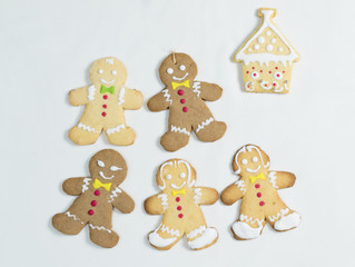 Naklejka premium Gingerbread home made cookie boy girl and house