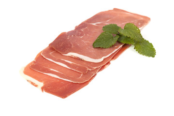 closeup on a piece of spanish serrano ham