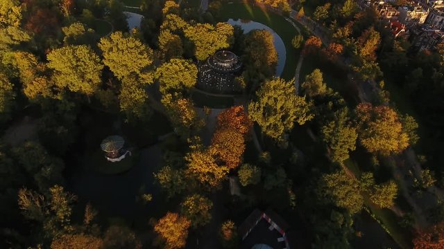 Amsterdam Vondelpark in the fall, filmed from the air looking down.