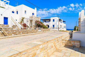 Typical Greek style apartments on street in Naoussa town on Paros island, Greece