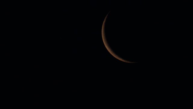Time-lapse footage of a waning crescent