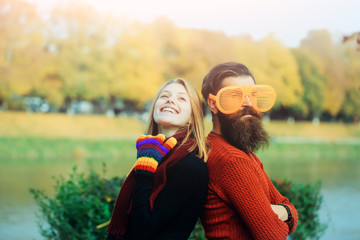 Fototapeta premium Young couple in autumn park