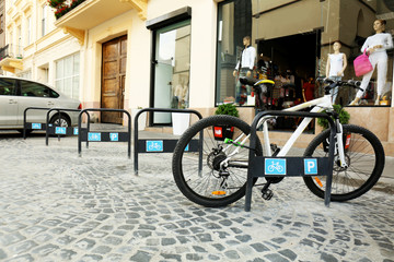 Fototapeta na wymiar Parking places for bicycles outdoors