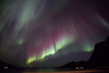 Strong red and green auroras