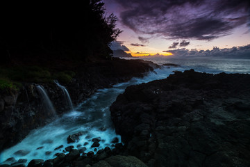 Sunset along the Queens Bath area of Kauai, Hawaii