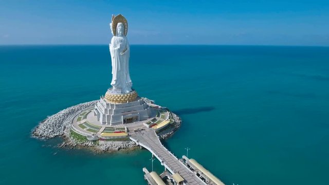 Aerial view of a massive white Buddha statue on Hainan island in the South China Sea