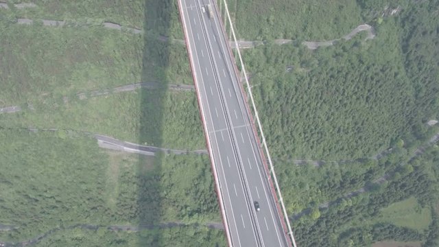 Aerial flight over the modern Aizhai suspension bridge in China
