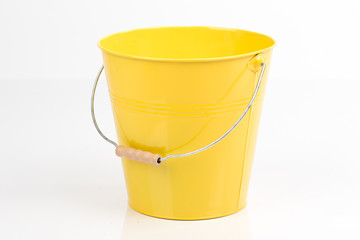 Iron/metal bucket/pail/container with handle isolated on white background. For children education,entertainment, gardening, household ideas,designs,themes,concepts. Colorful kid child toys.