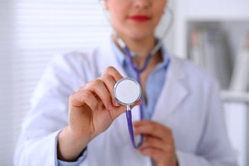 Doctor with a stethoscope in the hands