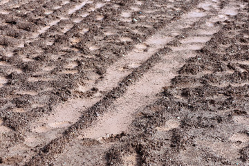 Tractor track marks in the mud
