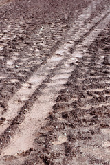 Tractor track marks in the mud
