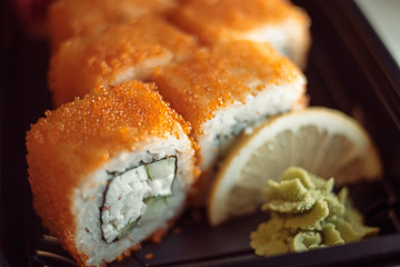 Rolls made of Fresh Raw Salmon and Cream Cheese inside Macro Shot Shallow Depth of Field. Selective focus