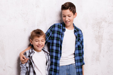 Two young brothers posing.