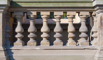 Ornate Rail Columns on Building