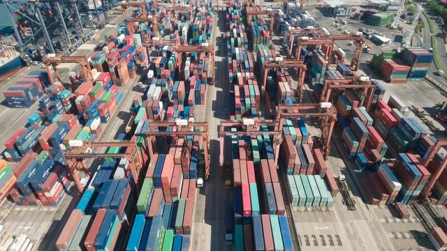 Shipping cargo, global trade, drone shot container terminal Hong Kong Asia