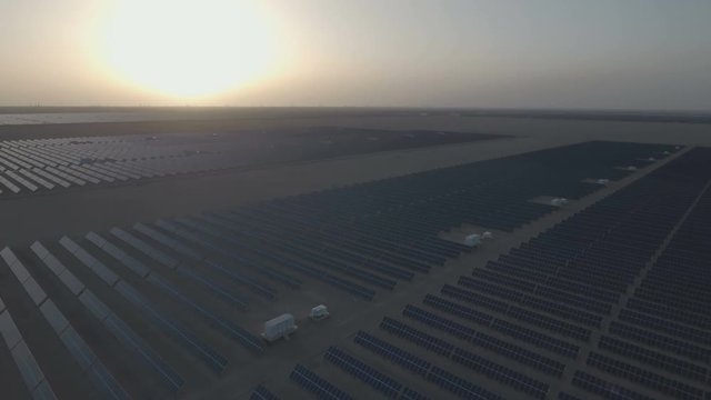 Solar panel fields in the Chinese deserts at sunset