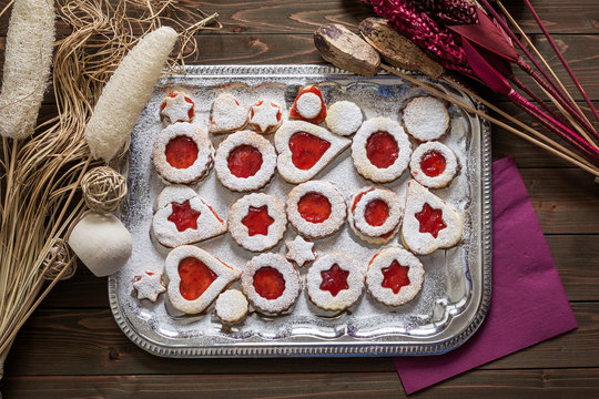 Christmas Cookies with Strawberry Jam on a Silver Platter