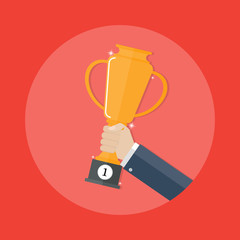 gold trophy for winner. hands holding gold winners cup.Business success,business concept ,