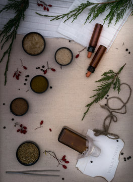 Alchemy Lab. dried herbs, salt, flasks, pipettes, recipes on the old canvas. top view