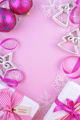 Modern festive pink theme Christmas holiday background with deco