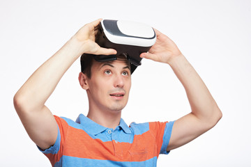 Man look up wearing VR glasses