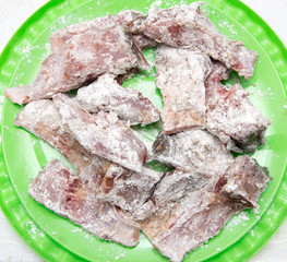 fish pieces in flour