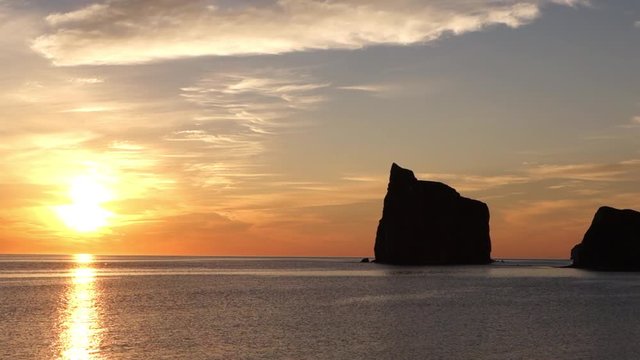 Sunrise behind Perce rock in Gaspesie, Canada, 2016