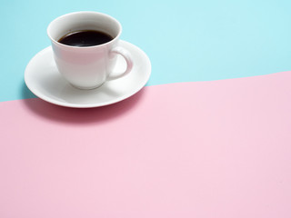 Top view of colorful cup of coffee and glasses on color blue and pink  background for create idea for business or design .Relax coffee time .
 (flat lay)