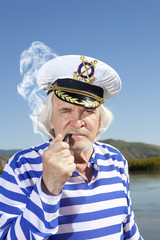 Captain smokes a pipe