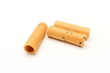 tong muan (a type of rolled wafer, a traditional dessert in Thailand), isolated on a white background, Thai snack