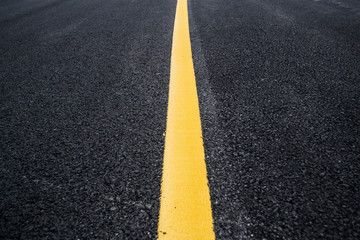 Asphalt with yellow road line