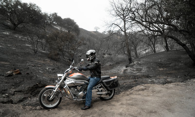 Obraz na płótnie Canvas Motorcycle After a Forest Fire