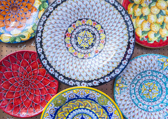 Colorful Ceramic Plates on Display in a Market in Positano Italy