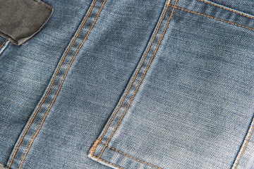 Fototapeta premium Blue jean back pocket,Blue denim back pocket with copy space for texture