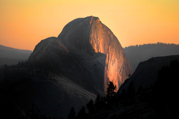 Half dome in Yosemite national park  from boundary hill under evening sun