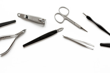 nail care - manicure set on white background top view