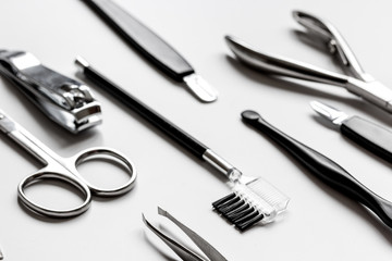 Fototapeta premium set of metallic manicure tools macro