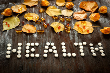 concept health - treatment with tea and medecine top view