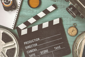 Fototapeta premium Clapperboard and a film reel
