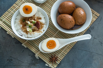 Cutted tea egg with star anise on bamboo mat