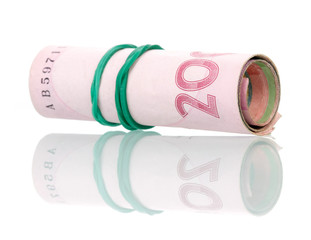 Ukrainian money in roll isolated on white background.