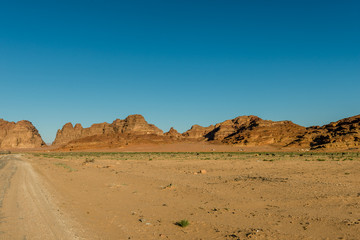 Fototapeta na wymiar Wadi rum landscape, desert and mountains, Jordan. Road on adventure