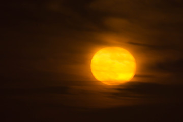 full moon rises over the Atlantic in South Carolina