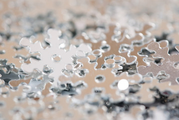 Christmas decoration of silver confetti snow flake