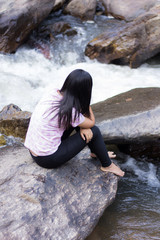 Thai woman with Mae Ya waterfall, Chiangmai Thailand
