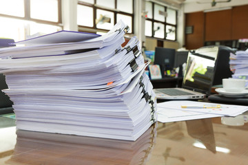 Business Concept, Pile of unfinished business documents on office desk, Stack of business paper