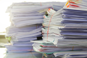 Business Concept, Pile of unfinished business documents on office desk, Stack of business paper