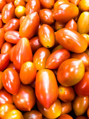 Cherry tomato. Red tomato. Texture and background.